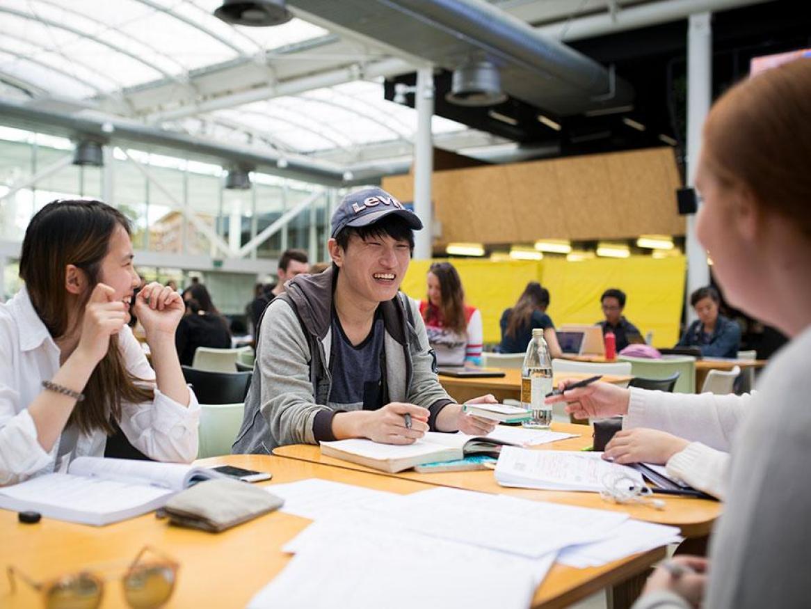 Students at desk in Hub Central