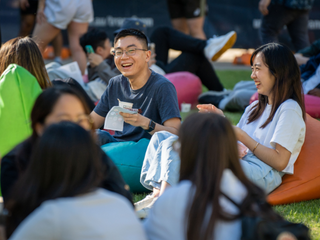 Students socialising while attending the CommuniTea event